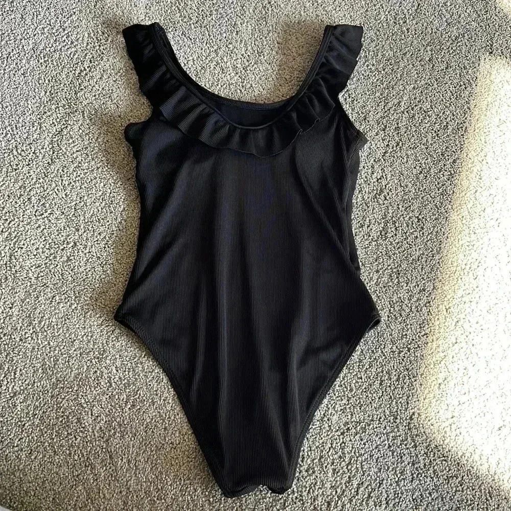 (16)  one piece swim suit